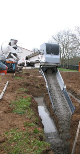 Réalisation de fondation d'une maison individuelle au tapis à goulotte rotative